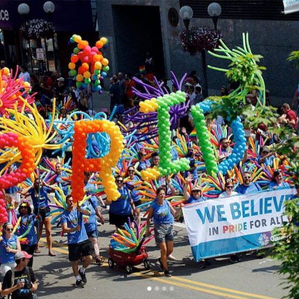 Pride parade with people marching